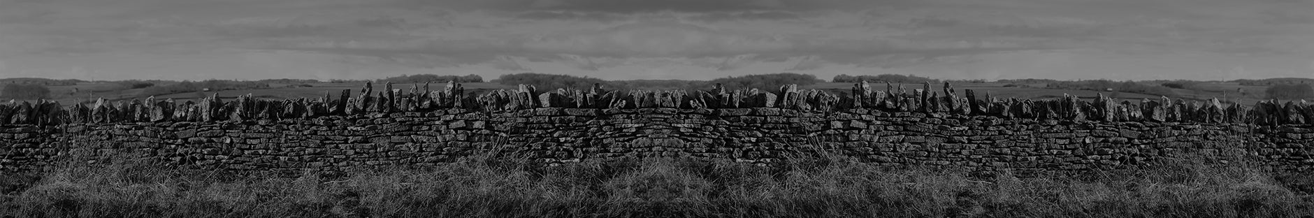 Black and white image of a dry stone wall