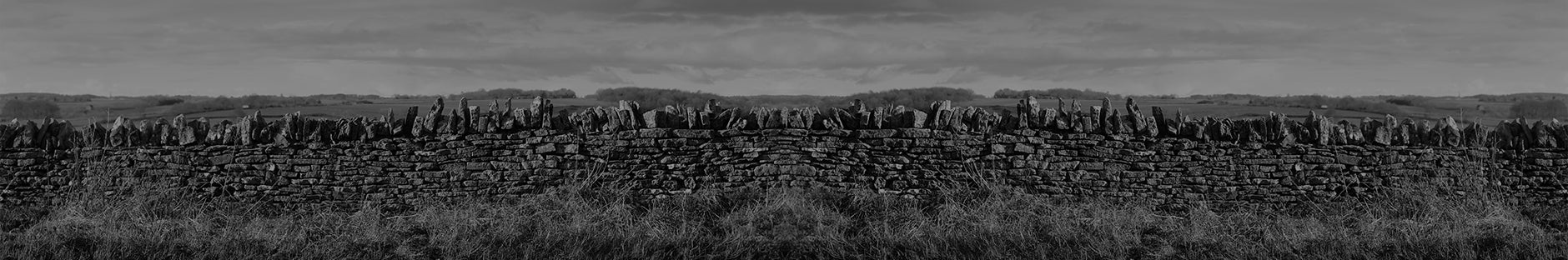 Black and white image of a dry stone wall