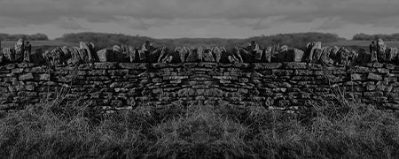 Black and white image of a dry stone wall