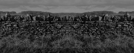 Black and white image of a dry stone wall
